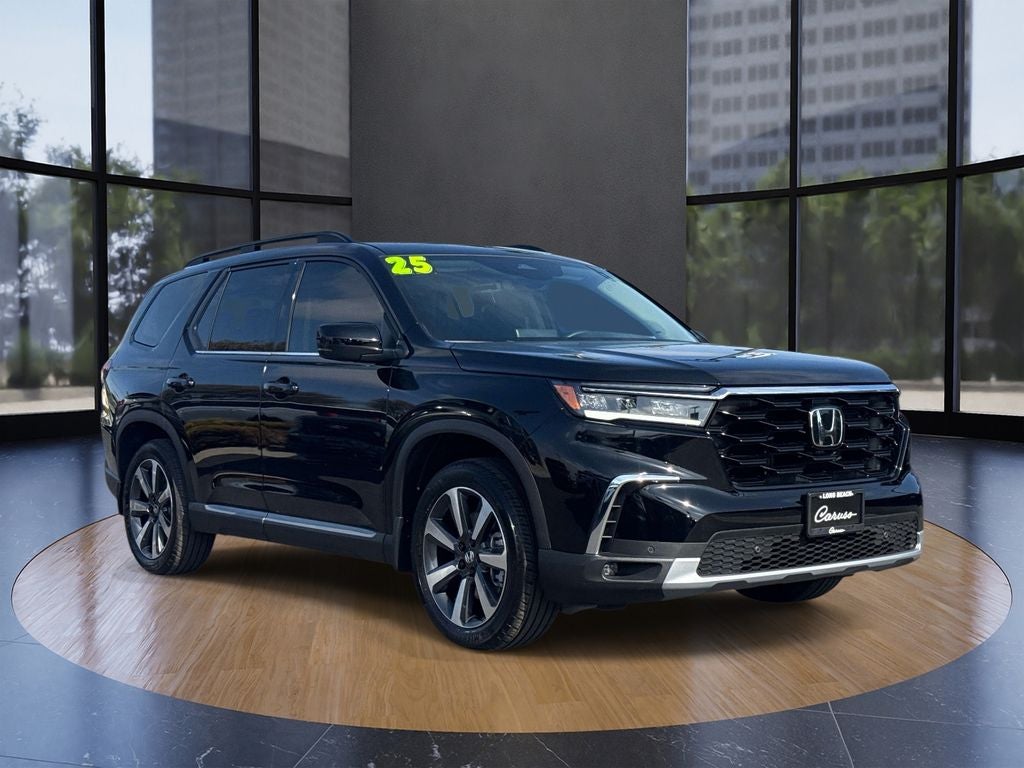 2025 Honda Pilot Touring in Black — front three-quarter view