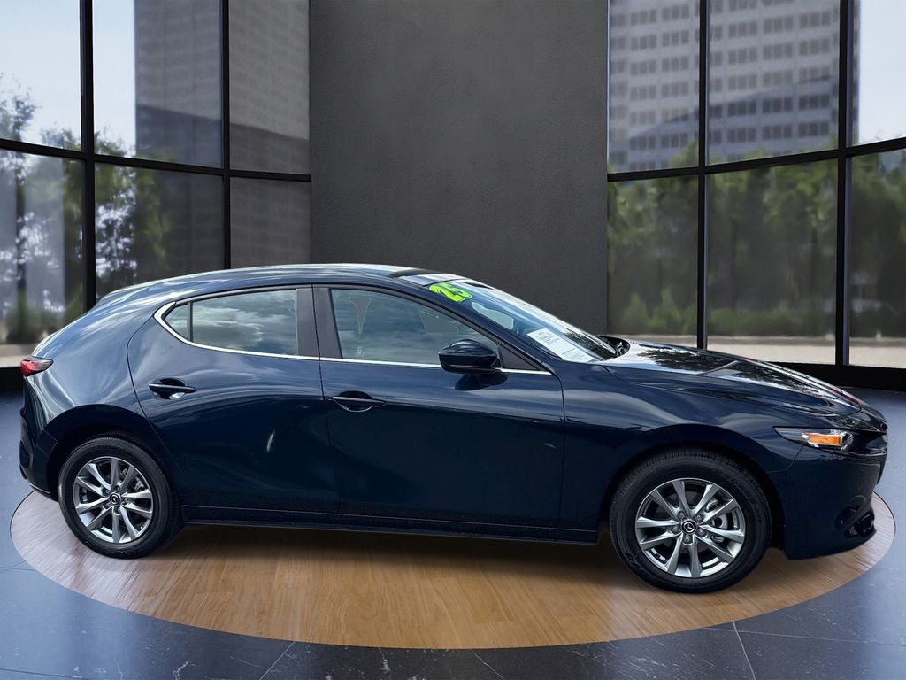 2025 Mazda Mazda3 2.5 S in Crystal Blue — front three-quarter view