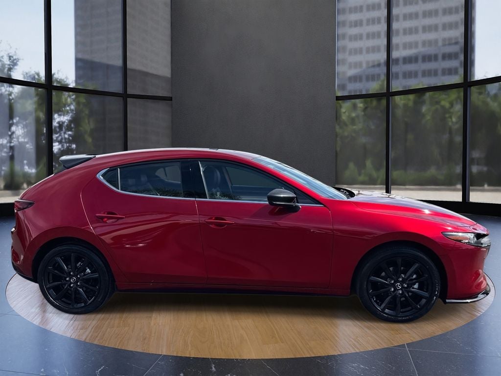 2026 Mazda Mazda3 2.5 Turbo Premium Plus in Red Crystal — front three-quarter view