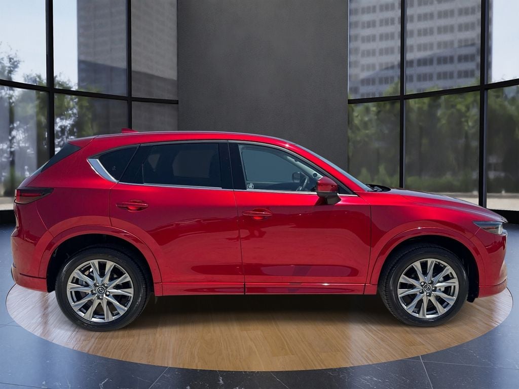 2025 Mazda Mazda CX-5 2.5 S Premium Plus Package in Red Crystal — front three-quarter view
